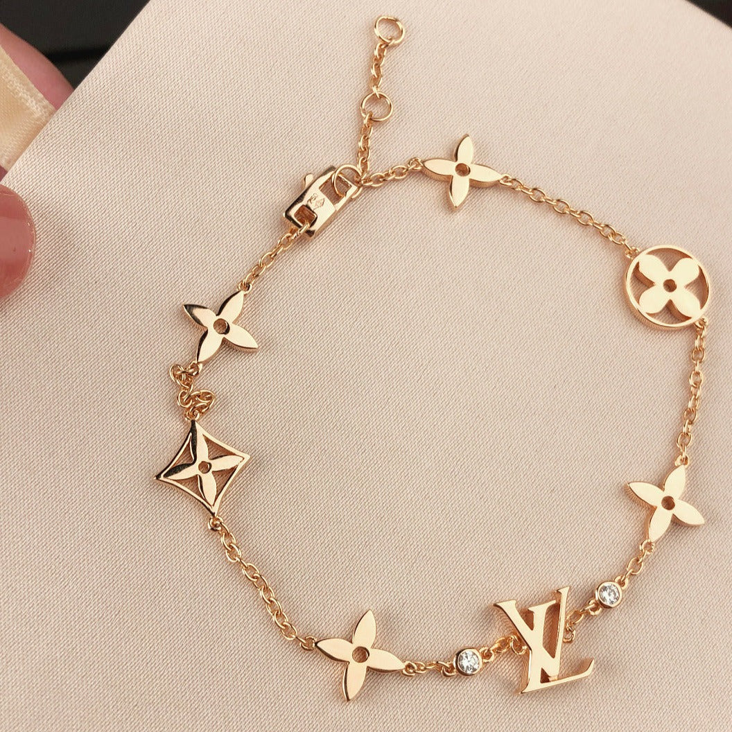 ¡®Glow Jewelry¡¯STAR AND SUN 7 MOTIFS GOLD BRACELET