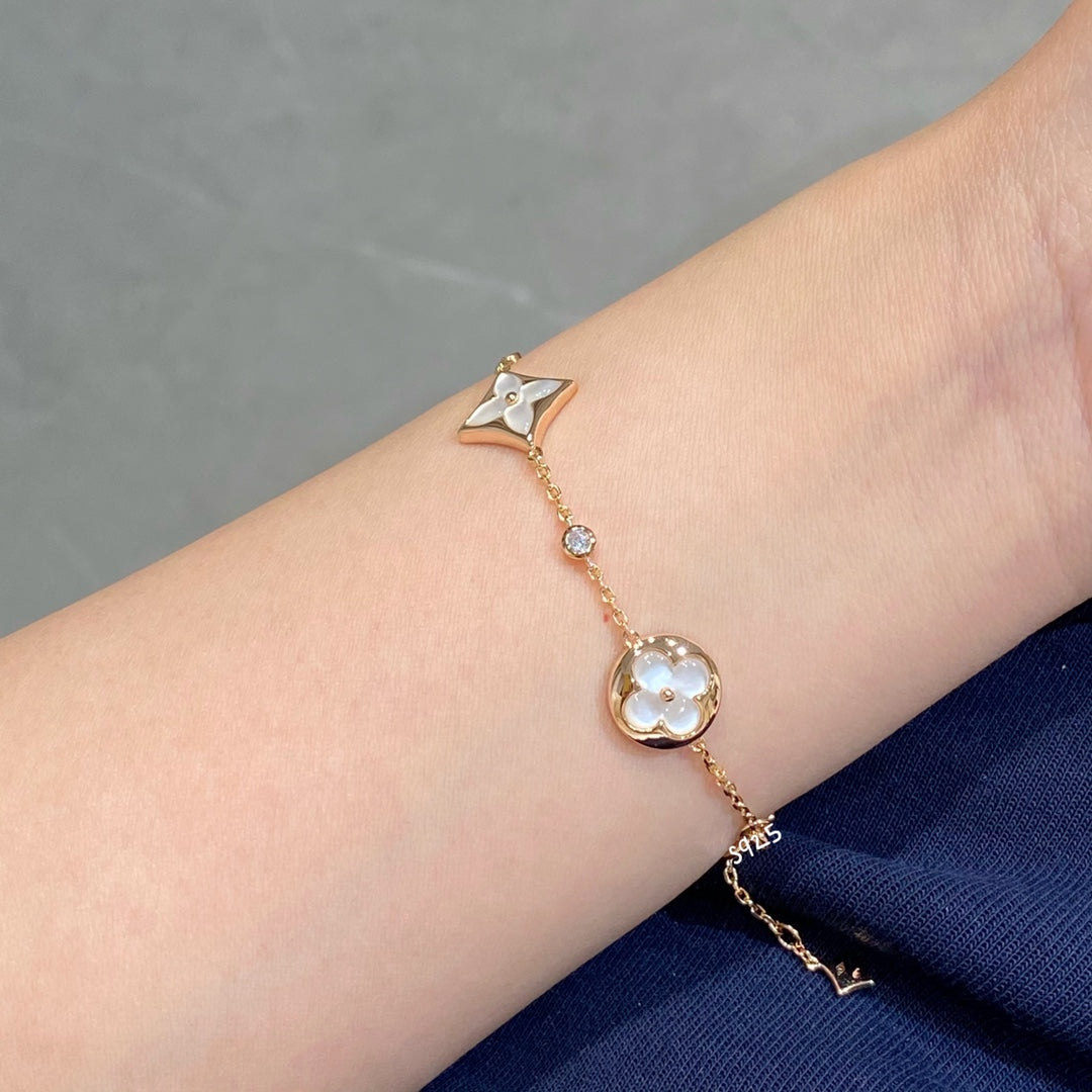 ¡®Glow Jewelry¡¯STAR AND SUN 4 MOTIF WHITE MOP PINK GOLD BRACELET