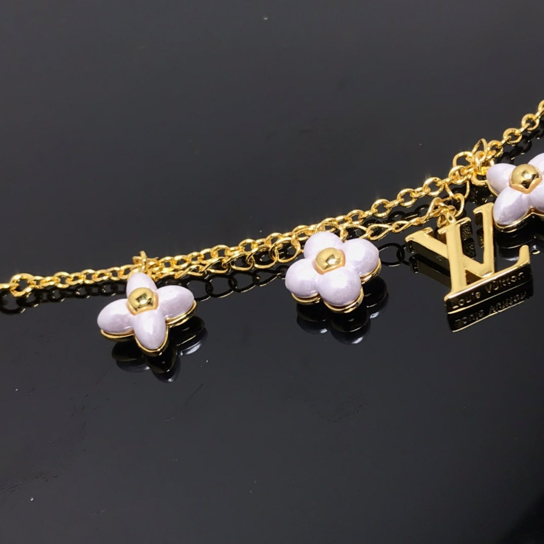 ¡®Glow Jewelry¡¯LOGO 6 MOTIF STAR AND SUN GOLD BRACELET
